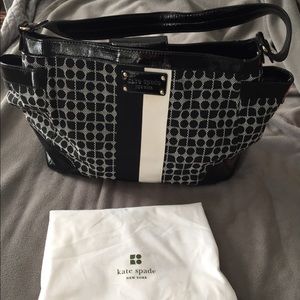 Like new Kate Spade classic Noel with dust cover!!